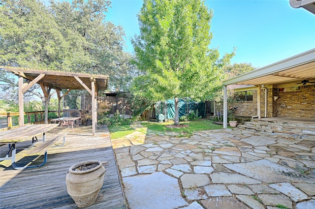 view of patio / terrace featuring a wooden deck