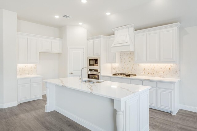 dining space featuring light hardwood / wood-style flooring, vaulted ceiling, and a healthy amount of sunlight