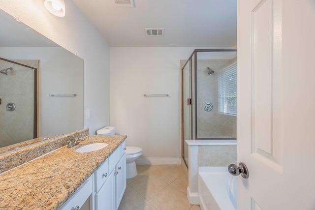 full bath featuring a stall shower, tile patterned flooring, visible vents, and vanity