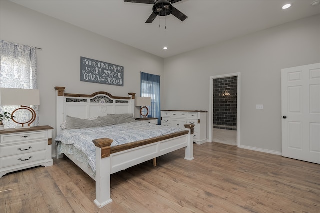 bedroom featuring light hardwood / wood-style flooring and ceiling fan