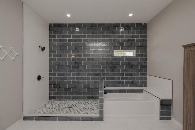 bathroom with plus walk in shower and tile patterned floors