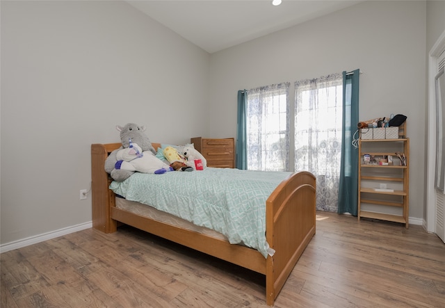 bedroom with wood-type flooring