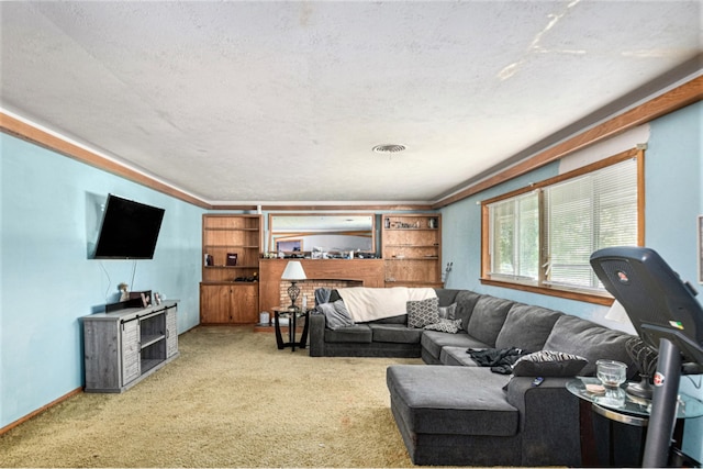 carpeted living room featuring a textured ceiling and a fireplace