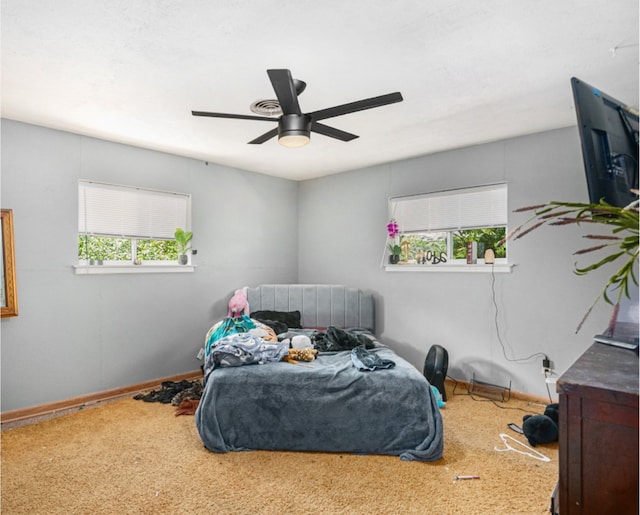 bedroom featuring carpet and ceiling fan