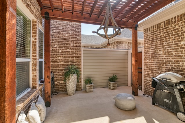 view of patio / terrace with a pergola and area for grilling