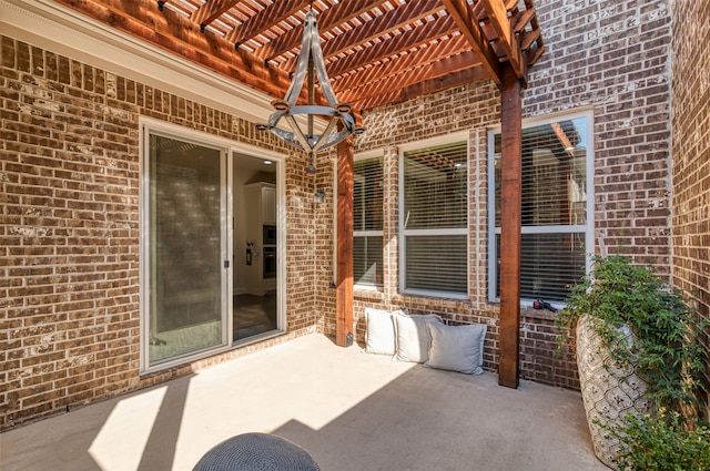 view of patio featuring a pergola