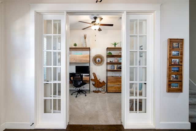 office space with french doors, ceiling fan, and carpet flooring