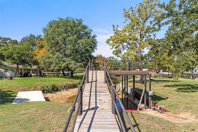 dock area featuring a lawn