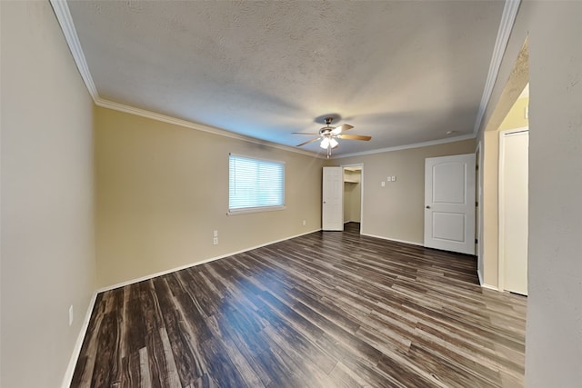 unfurnished bedroom featuring a textured ceiling, dark hardwood / wood-style floors, ceiling fan, and crown molding