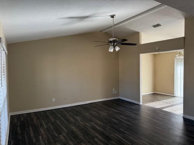 empty room with dark hardwood / wood-style flooring, lofted ceiling with beams, and ceiling fan