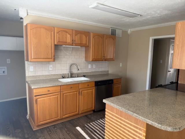 kitchen featuring dark wood-type flooring, sink, decorative backsplash, a textured ceiling, and black dishwasher