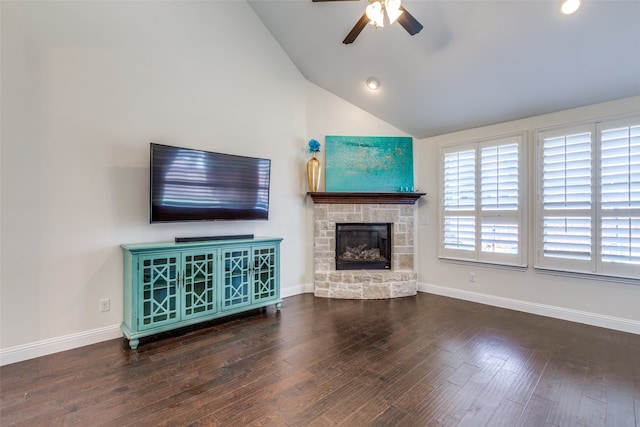 unfurnished living room featuring high vaulted ceiling, a fireplace, ceiling fan, and dark hardwood / wood-style flooring