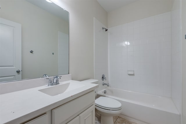 full bathroom with tiled shower / bath combo, tile patterned floors, vanity, and toilet