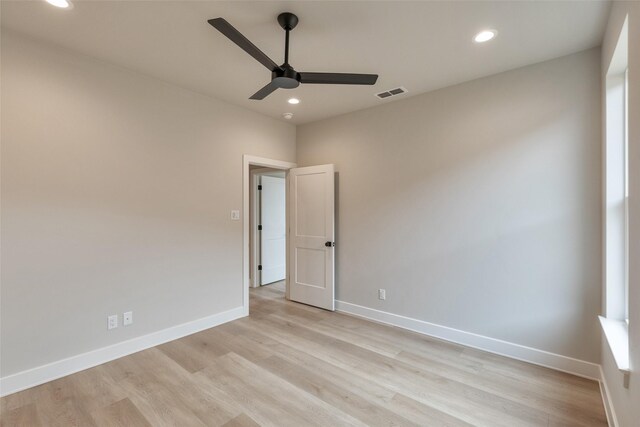 living room with a fireplace, a wealth of natural light, and lofted ceiling