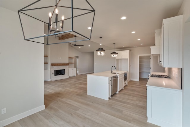 bathroom with hardwood / wood-style floors, vanity, and independent shower and bath