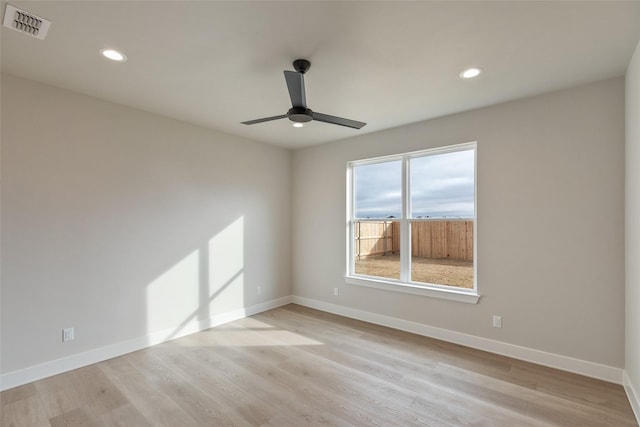 unfurnished room with light hardwood / wood-style floors and ceiling fan