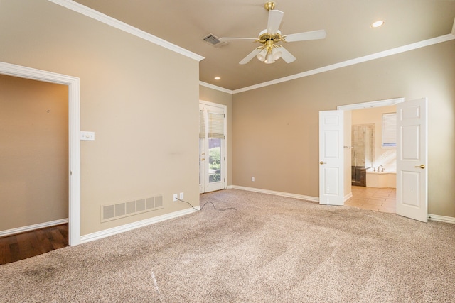 unfurnished bedroom with light carpet, ceiling fan, and crown molding