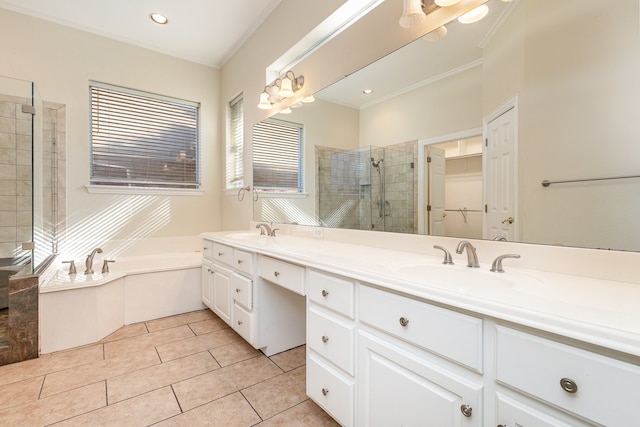 bathroom featuring vanity, crown molding, separate shower and tub, and tile patterned flooring