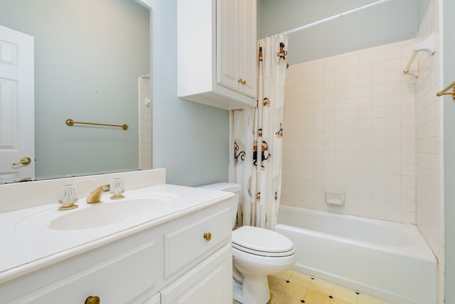 full bathroom featuring toilet, vanity, and shower / bathtub combination with curtain