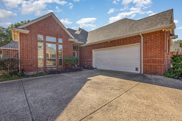 front of property with a garage