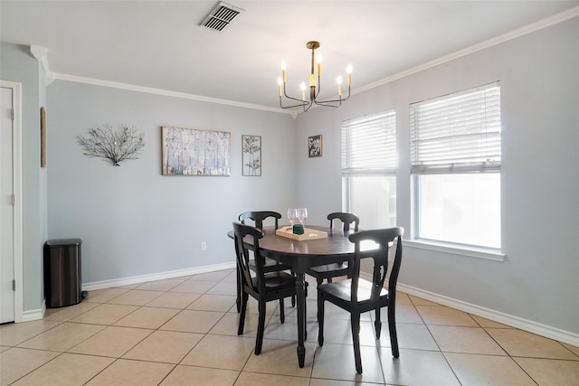 tiled dining space with ornamental molding and an inviting chandelier