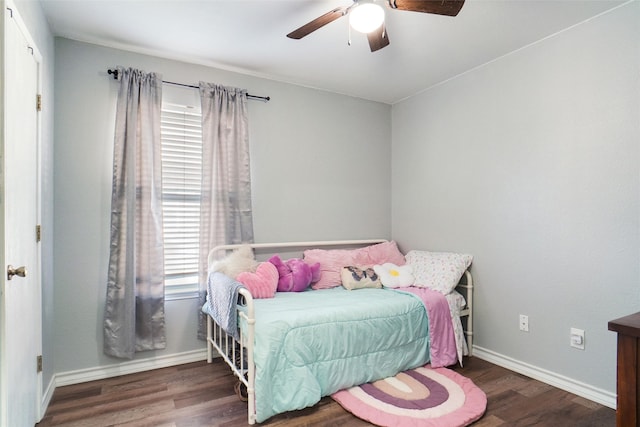 bedroom featuring ceiling fan and dark wood-type flooring