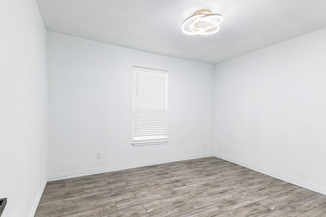 unfurnished room featuring light wood-type flooring