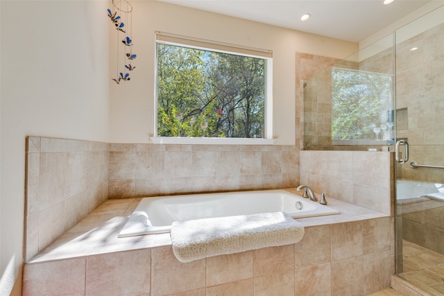 bathroom featuring plus walk in shower