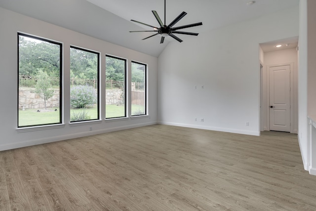 6709 Elderberry Way, Flower Mound, TX 76226 - spare room with vaulted ceiling, ceiling fan, and light wood-style floors