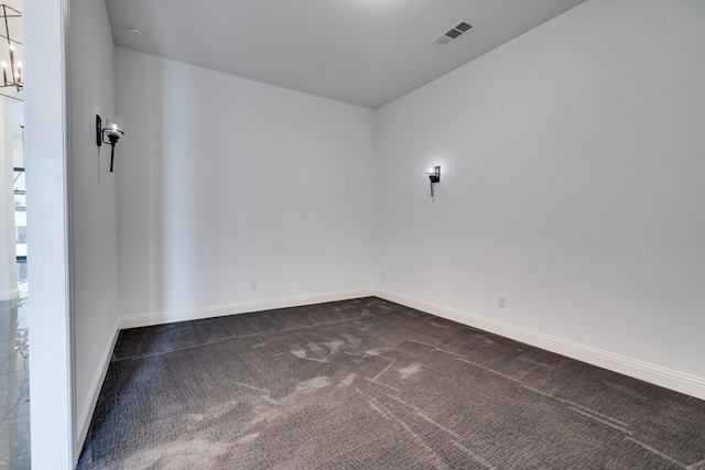 6709 Elderberry Way, Flower Mound, TX 76226 - spare room featuring dark carpet and a chandelier