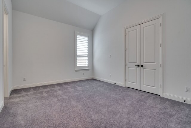 6709 Elderberry Way, Flower Mound, TX 76226 - unfurnished bedroom featuring lofted ceiling, carpet flooring, and a closet