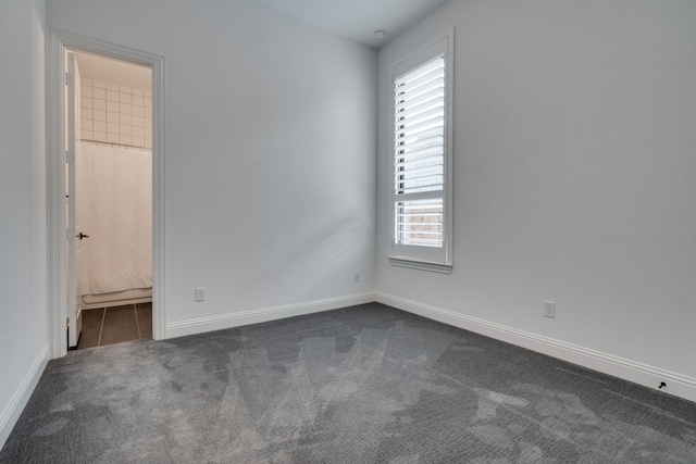 6709 Elderberry Way, Flower Mound, TX 76226 - empty room with dark colored carpet and plenty of natural light