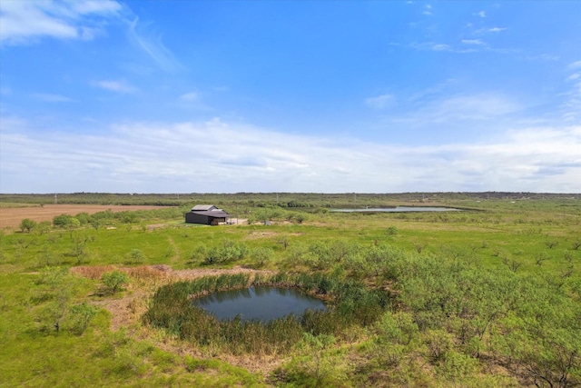 aerial view with a water view and a rural view