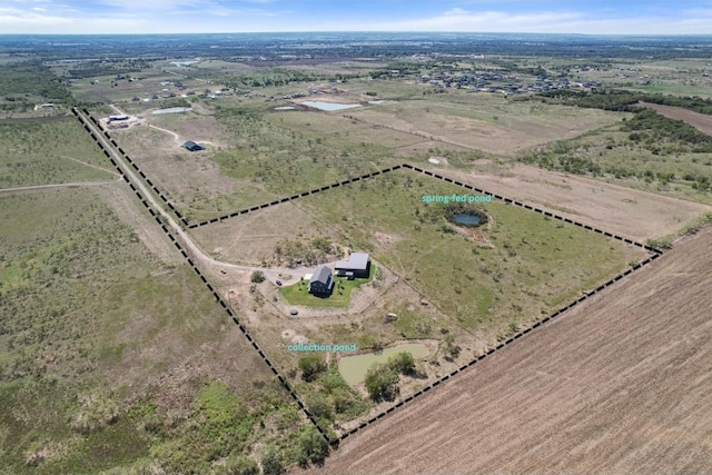 drone / aerial view featuring a rural view