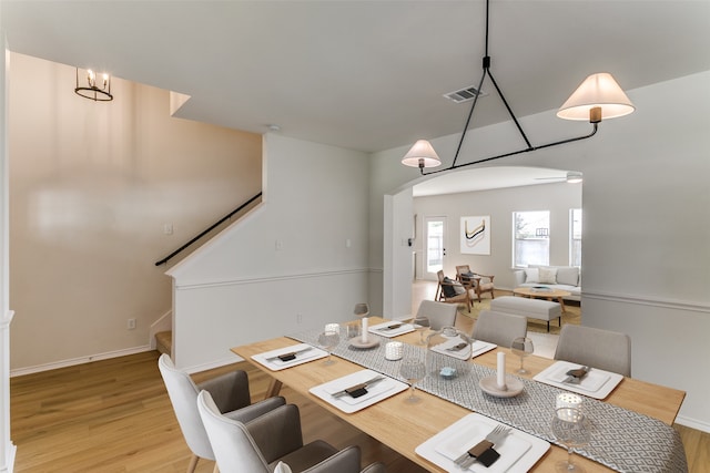 unfurnished dining area featuring hardwood / wood-style floors