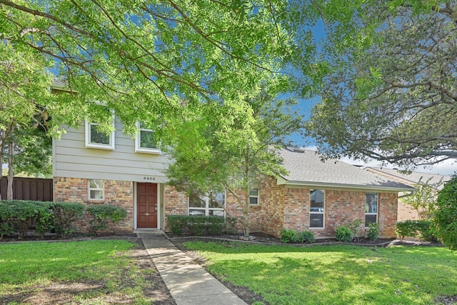 view of front facade with a front yard