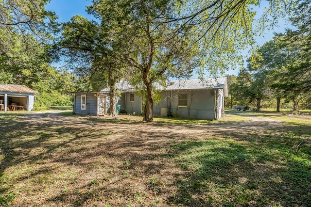 ranch-style home with a front lawn