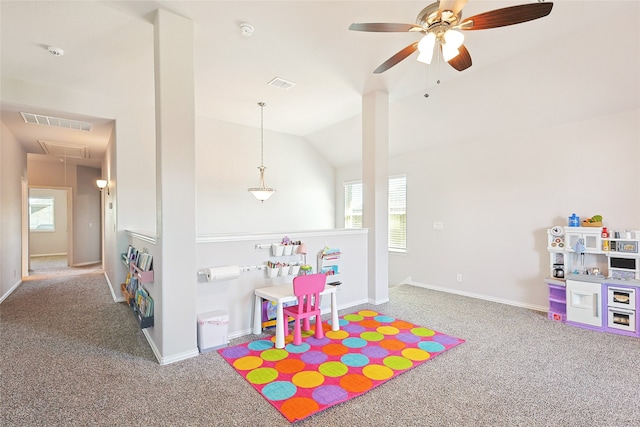 playroom featuring carpet, vaulted ceiling, and ceiling fan