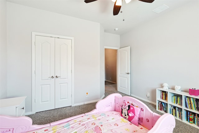 bedroom with carpet flooring, ceiling fan, and a closet