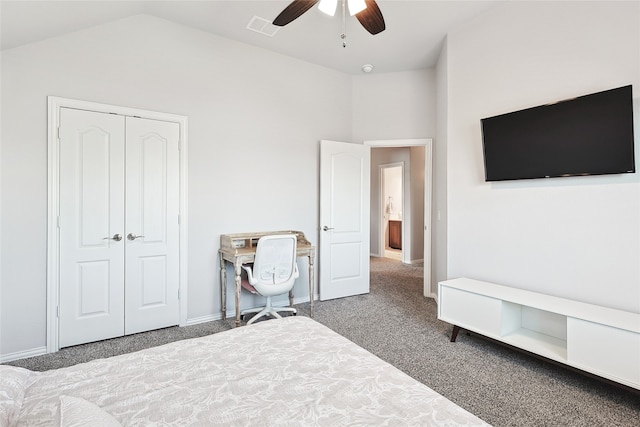 carpeted bedroom with lofted ceiling, ceiling fan, and a closet