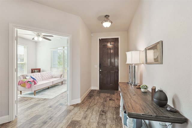 foyer featuring hardwood / wood-style floors and ceiling fan