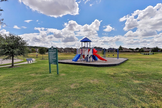 community play area with a yard