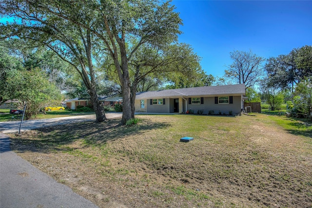 ranch-style house with a front yard