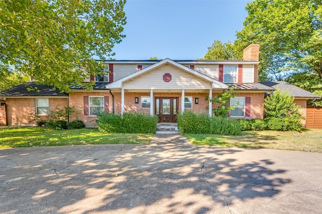 front of property featuring a front lawn