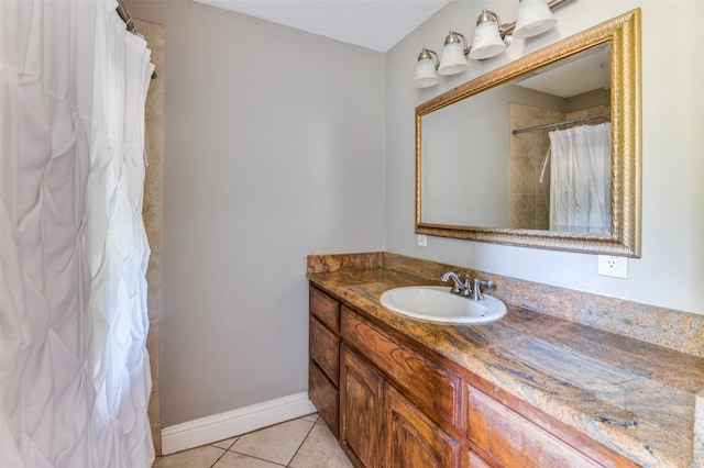 bathroom with tile patterned flooring, vanity, and a shower with curtain