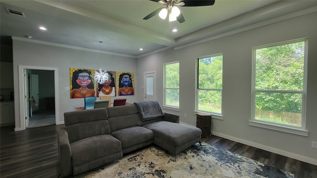 living room featuring a wealth of natural light, ceiling fan, crown molding, and dark hardwood / wood-style flooring