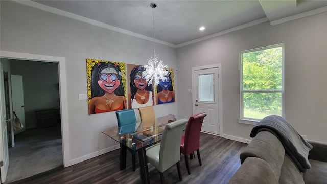 dining space featuring an inviting chandelier, ornamental molding, and dark hardwood / wood-style floors