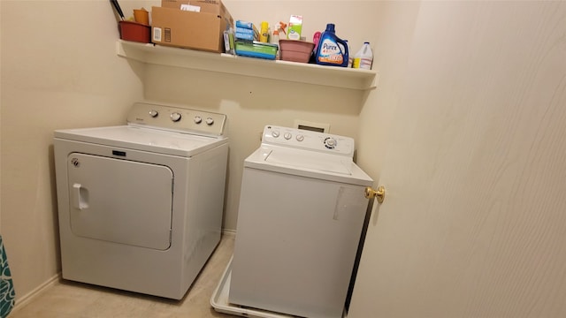 laundry area with separate washer and dryer