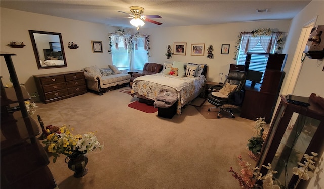 bedroom featuring carpet and ceiling fan