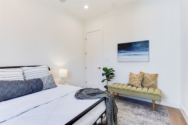 bedroom featuring hardwood / wood-style flooring